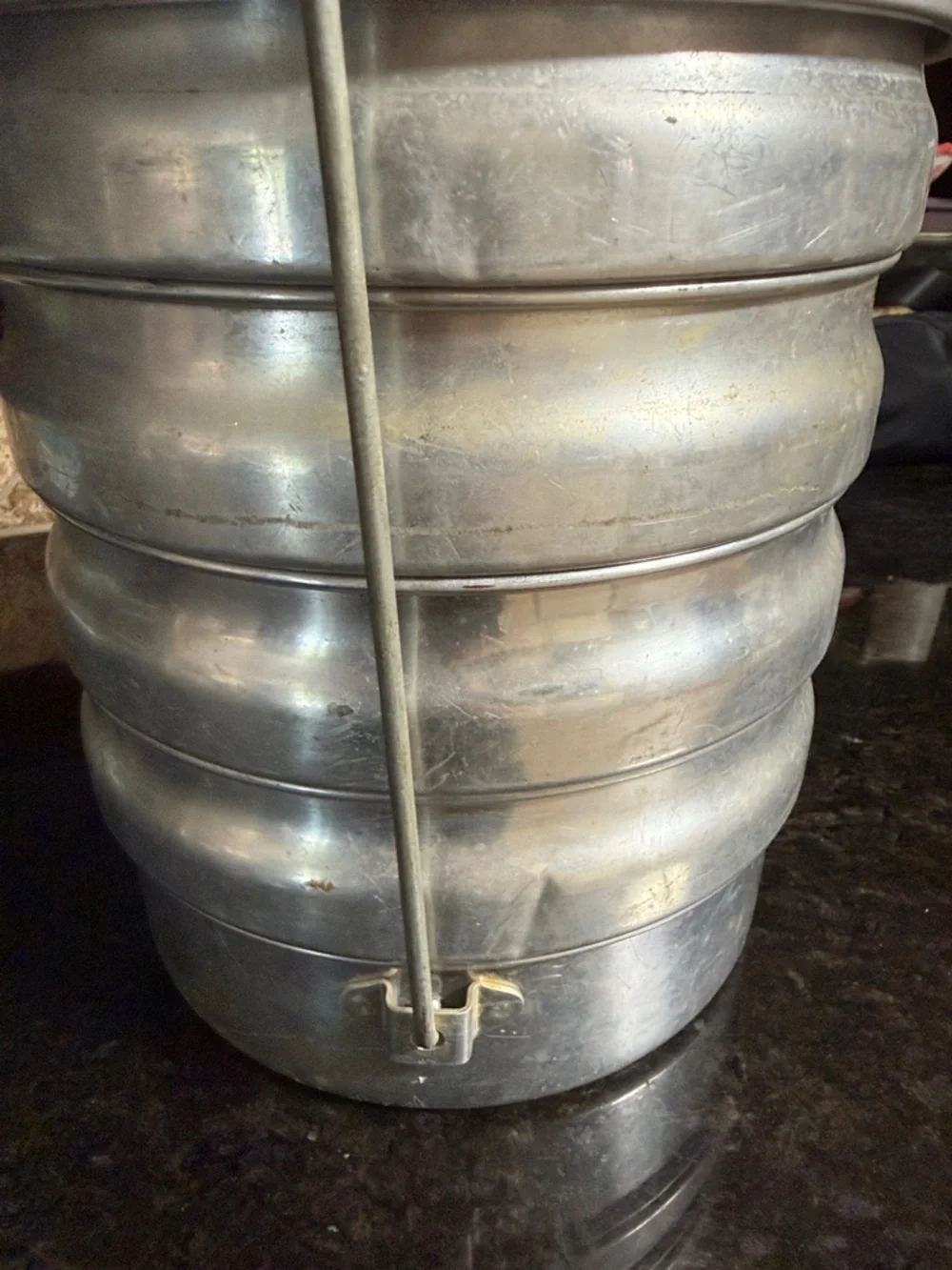 This vintage item is a Regal Aluminum Picnic Carrier.